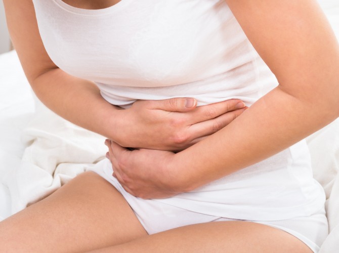 Woman Suffering From Stomach